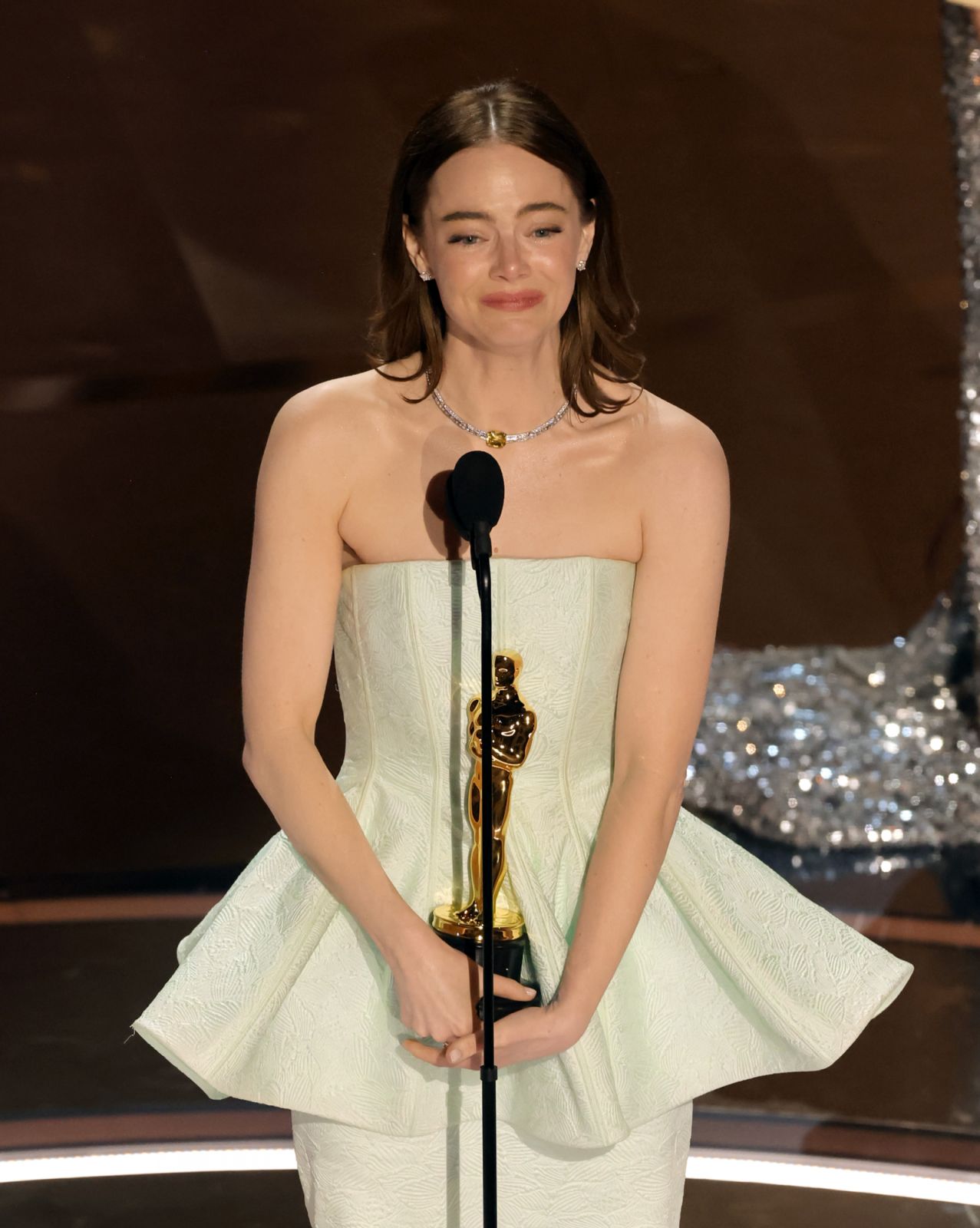 Emma Stone accepts the Lead Actress award for "Poor Things" onstage during the 96th Annual Academy Awards. (Photo by Kevin Winter/Getty Images)