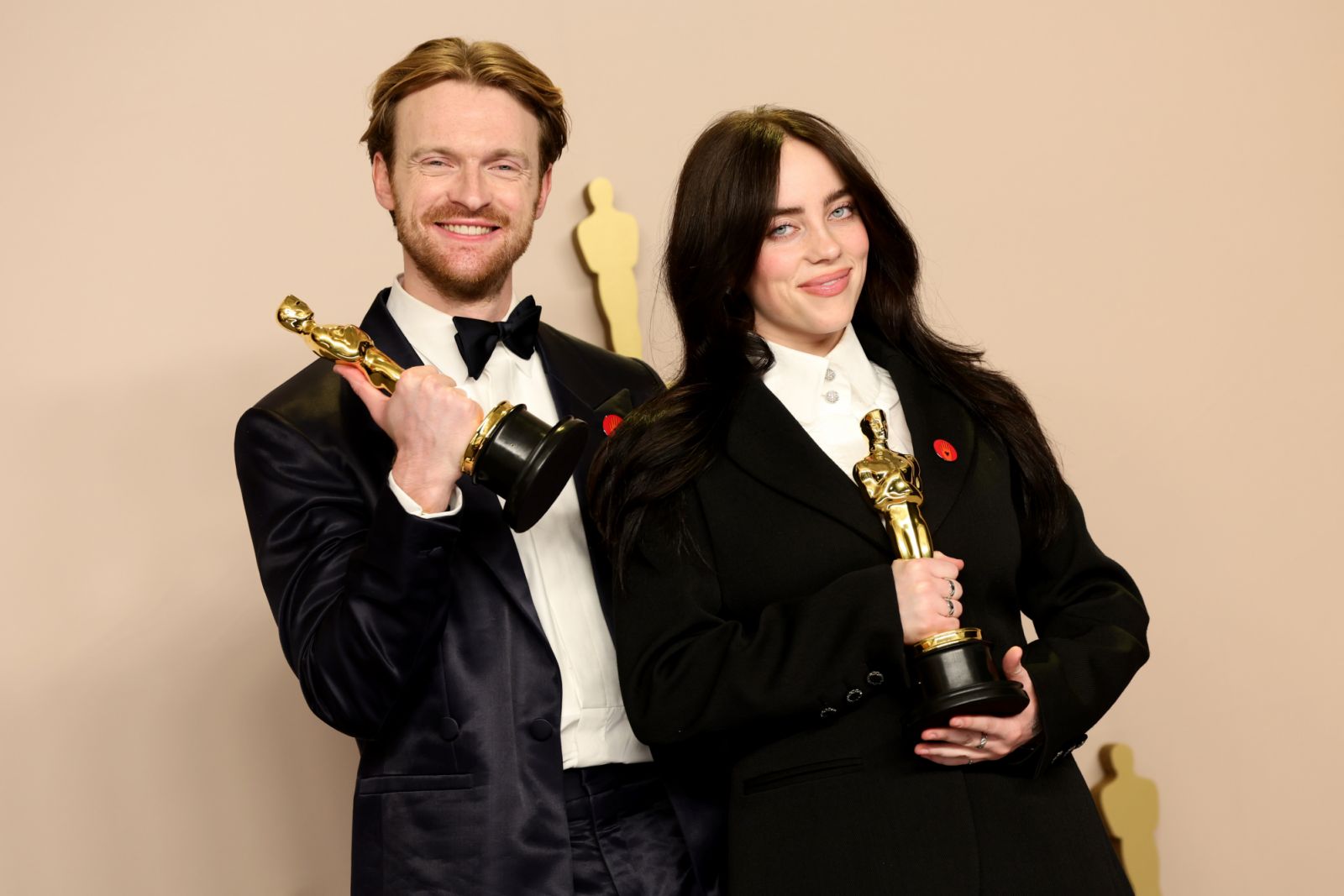Finneas O'Connell and Billie Eilish, winners of the Best Original Song award for ‘What Was I Made For?’ from ‘Barbie’, pose in the press room during the 96th Annual Academy Awards (Photo: Arturo Holmes/Getty Images)