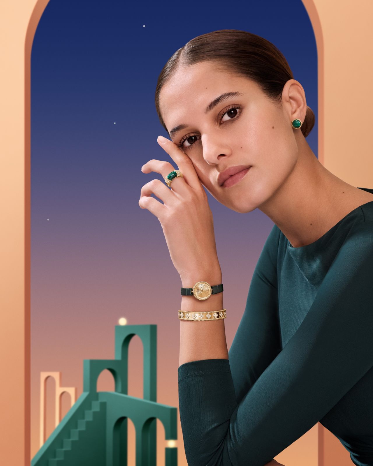Perlée couleurs earrings in yellow gold and malachite, Perlée couleurs ring in yellow gold, diamond, and malachite, Perlée watch, Perlée clovers bracelet in yellow gold and diamond
