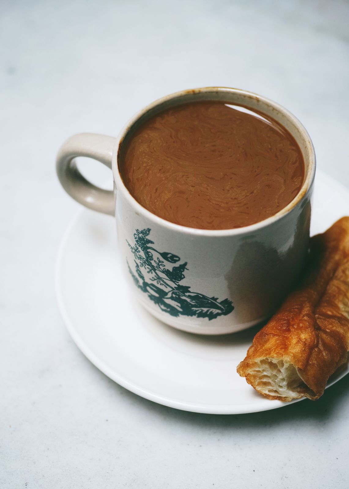 Ipoh white coffee with you tiao (Photo: Getty Images)