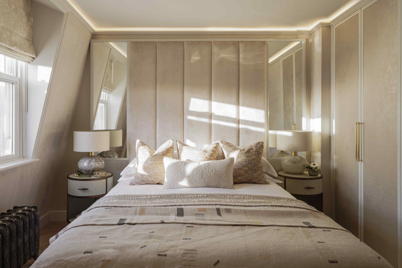 Suede walls embellish the main bedroom