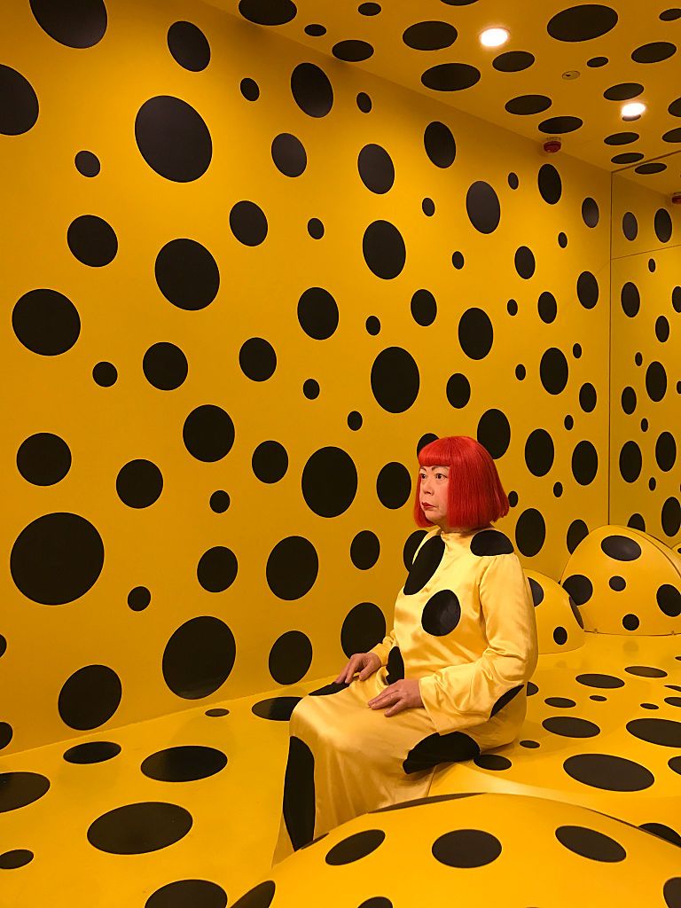 HONG KONG - NOVEMBER 02:  The wax figure of Japanese artist Yayoi Kusama is surrounded by the polka dots at Madame Tussauds Hong Kong on November 2, 2016 in Hong Kong, China.  (Photo by Visual China Group via Getty Images/Visual China Group via Getty Images)
