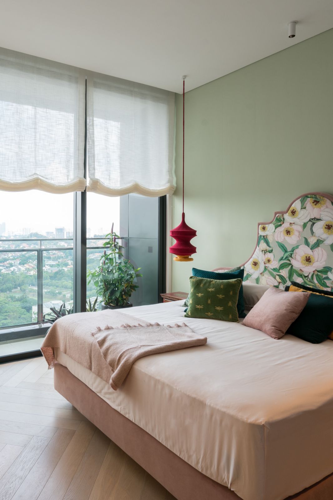 The bedhead in the guest bedroom which doubles as the elder daughter’s room who loves pink was upholstered in Peonies.