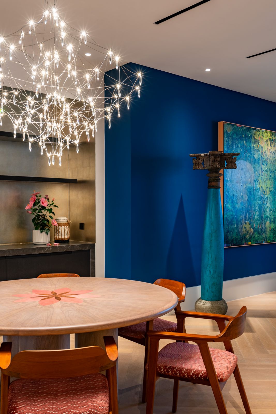 The chandelier is reminiscent of takes-on the shape of KL tower
