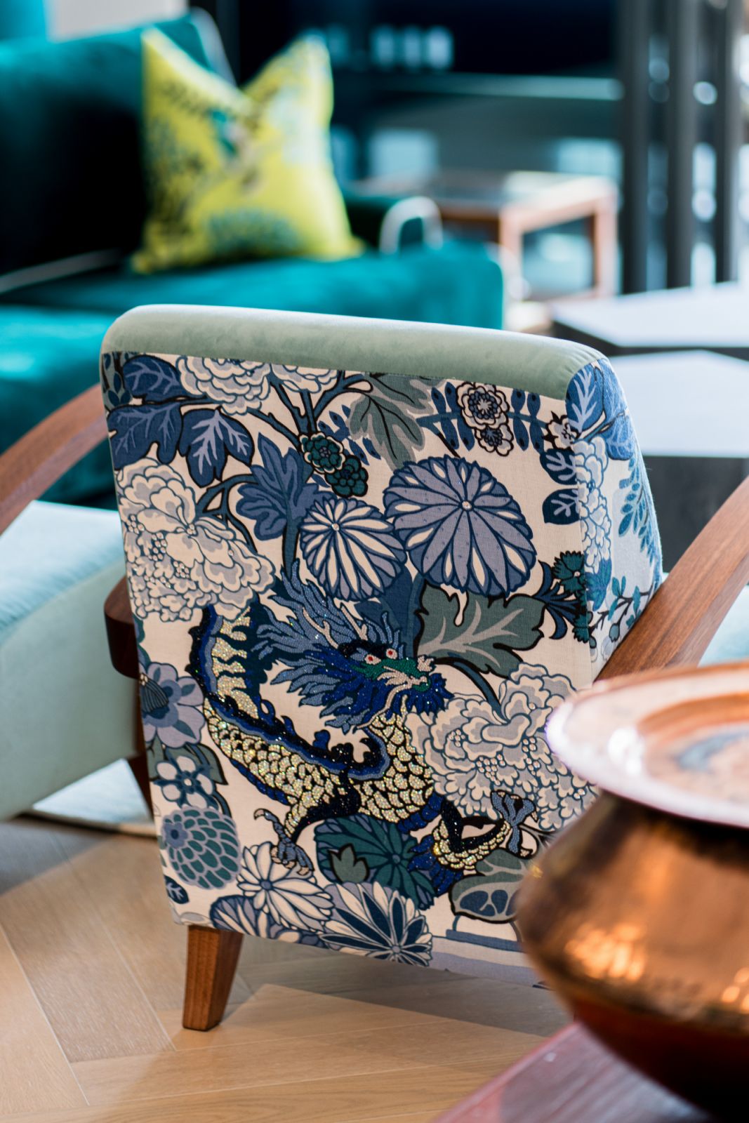 The pair of China-Blue dragon club chairs