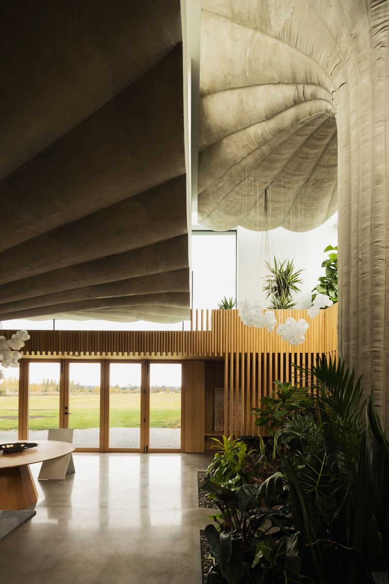 The columns' differing heights create a varied spatial experience