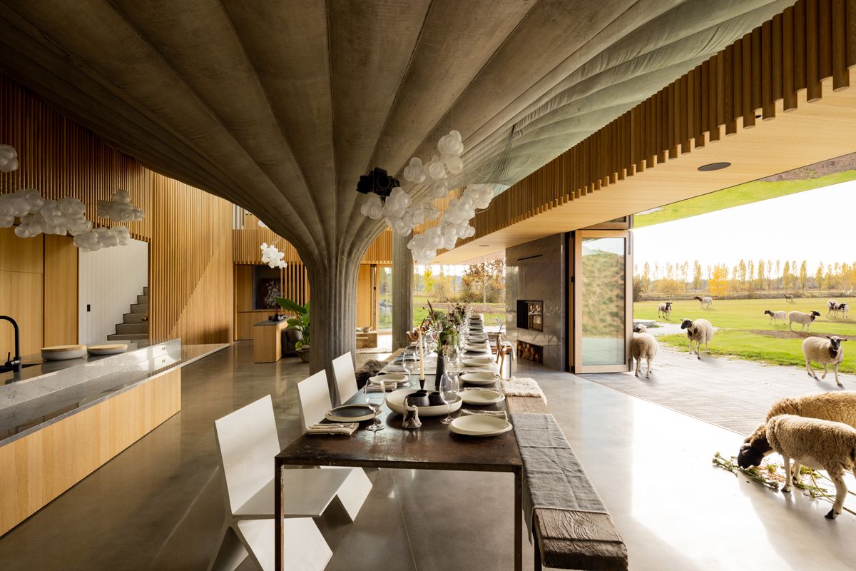The dining room overlooks the flat farmland outside