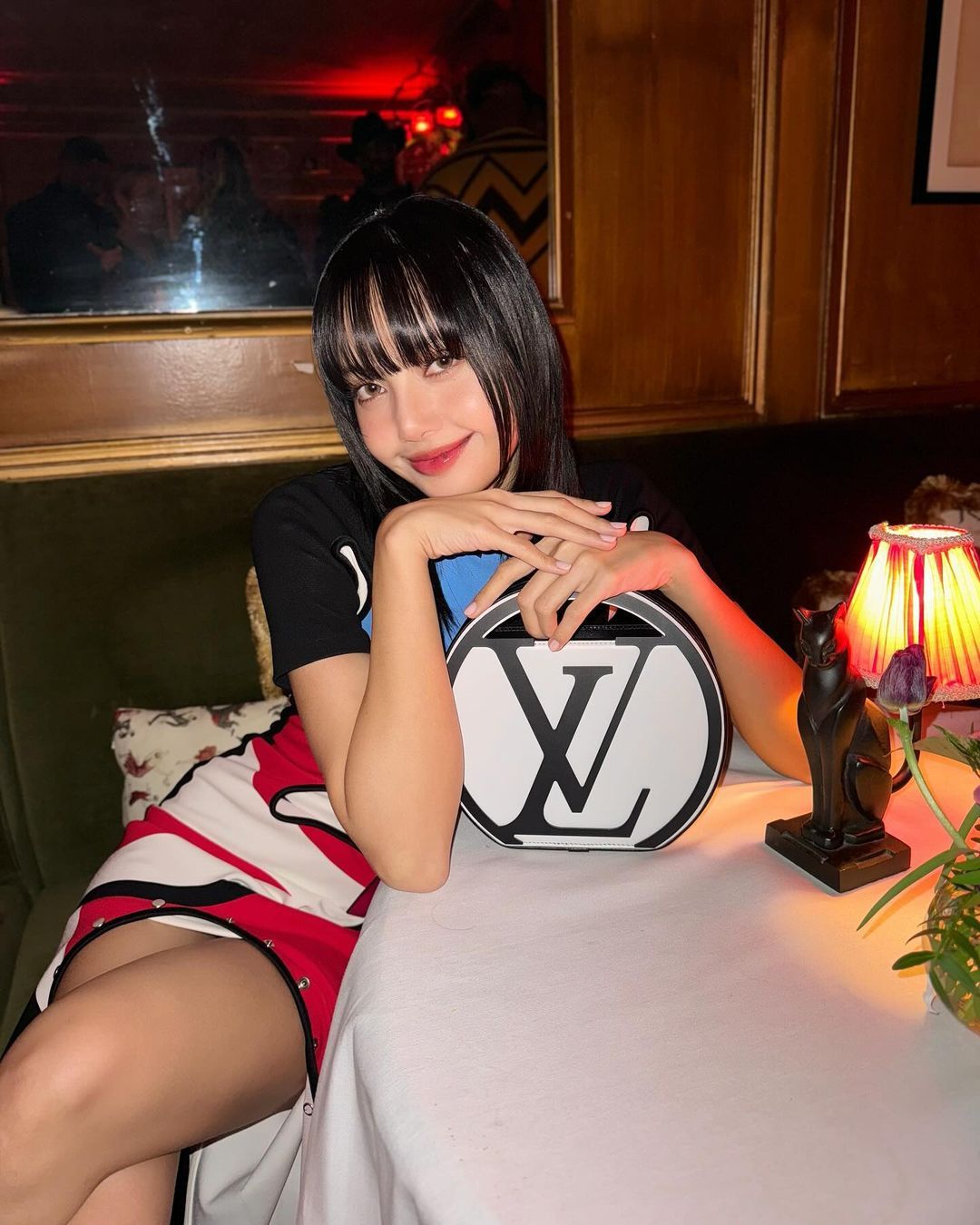 Blackpink's Lisa with Louis Vuitton Around Me PM