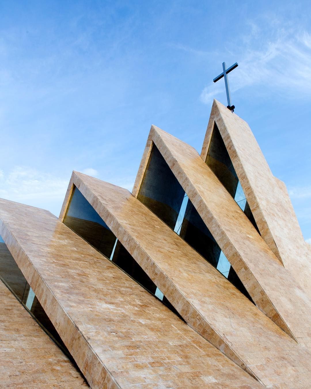 The triangular forms are apt representations of the Holy Trinity (Photo: Ed Simon via @buensalido_arch / Instagram)