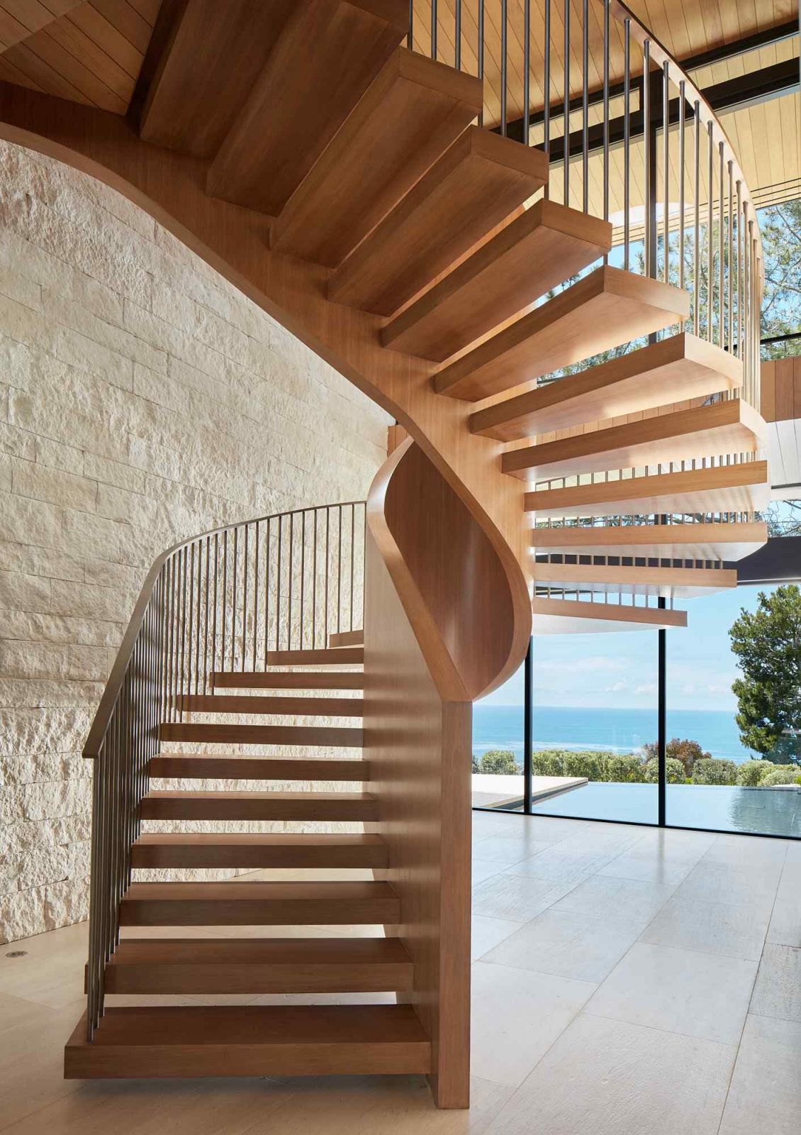 The dramatic wooden staircase
