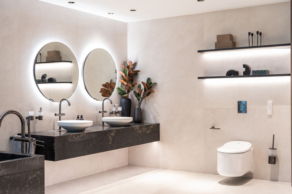 A corner decked with his and hers washbasins at Grohe Spa floor at the Lixil Experience Centre
