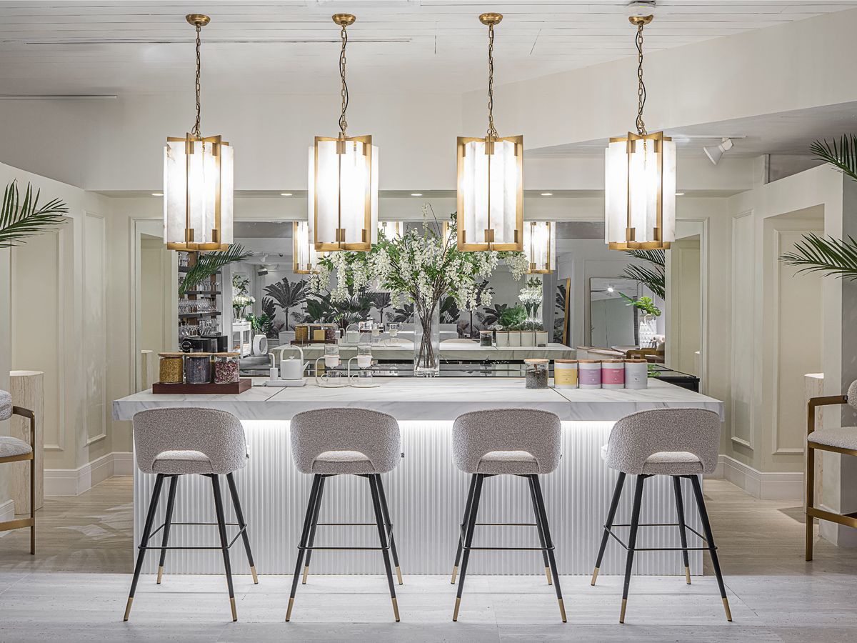 A luxurious kitchen dressed in white at Prelude Living