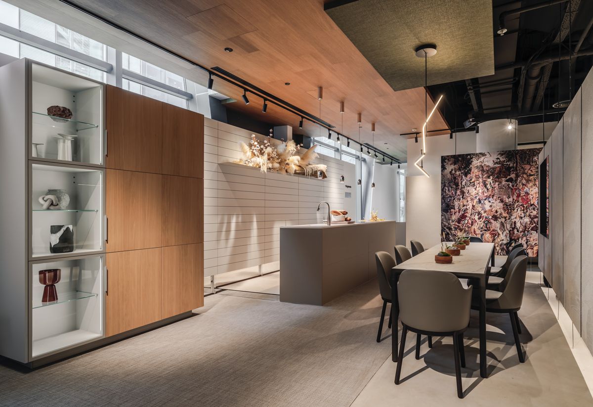 A setting that showcases a compact kitchen and dining setting