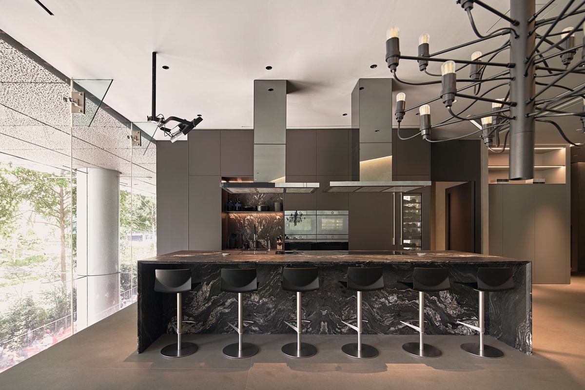The handsome island counter clad with dark Italian marble at the V-Zug Ion Orchard showroom