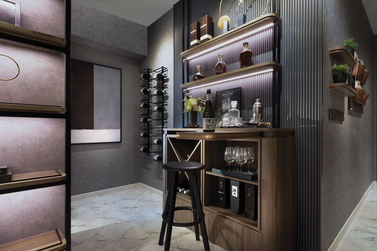 Wine racks and backlit shelves showcase the various ways a prospective buyer could create a home-bar concept within the show apartment at the Sceneca Residence viewing gallery