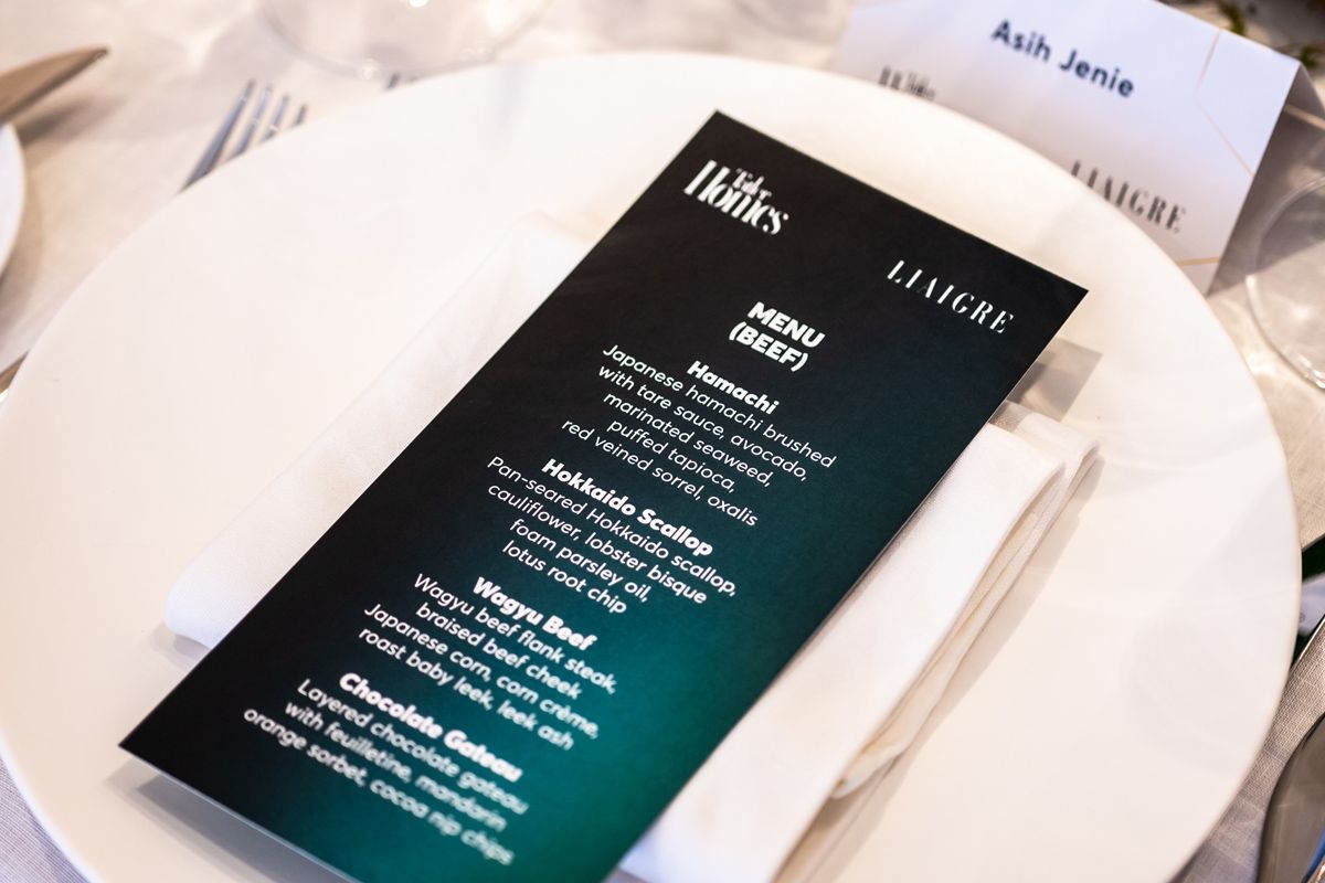 Chef's Table menu with Hamachi beef main course