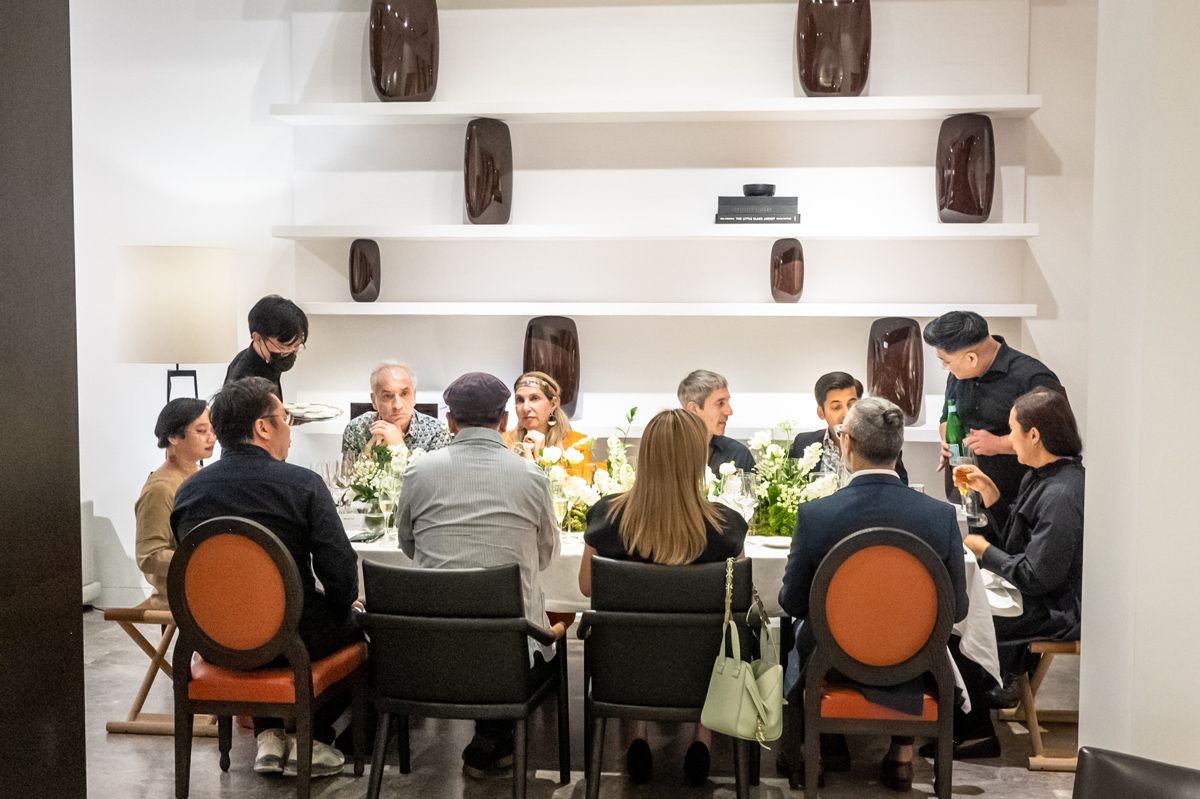 The Chef's Table team serving the wine