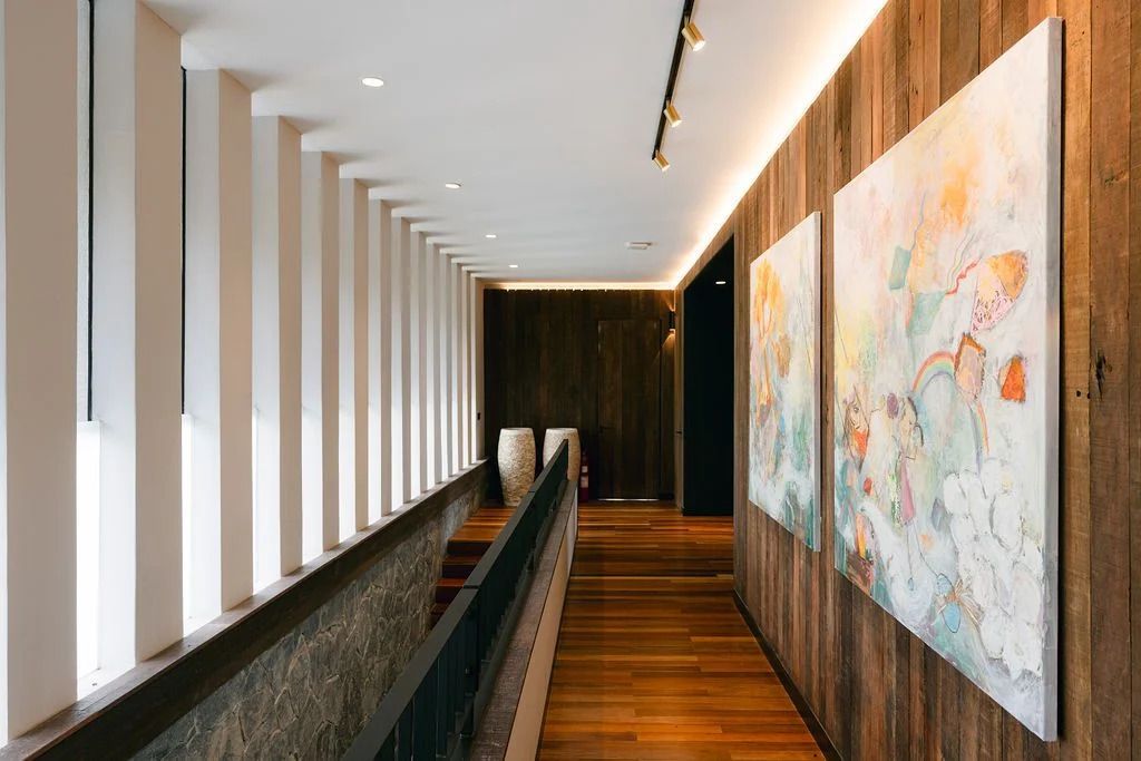 Reclaimed wood panelling and curated artworks (Photo: Memories.my)