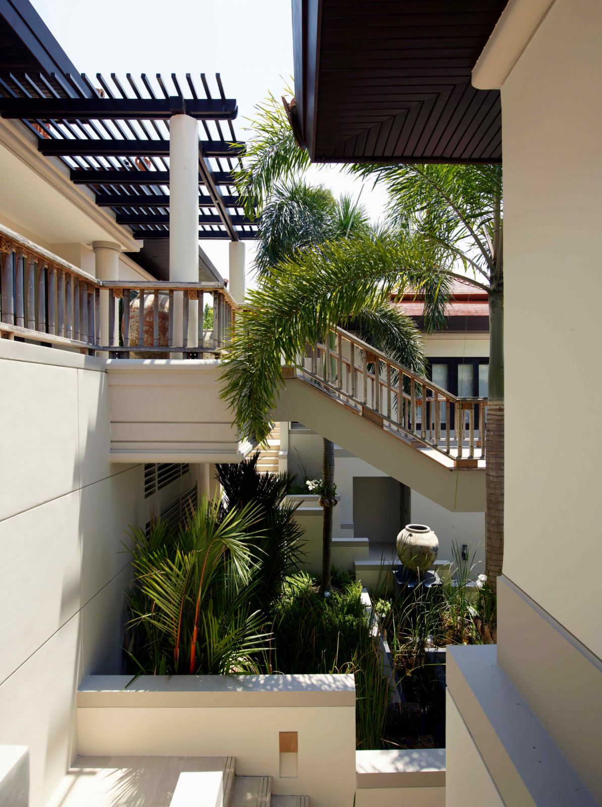 The villa units are interconnected under dark-coloured roofs