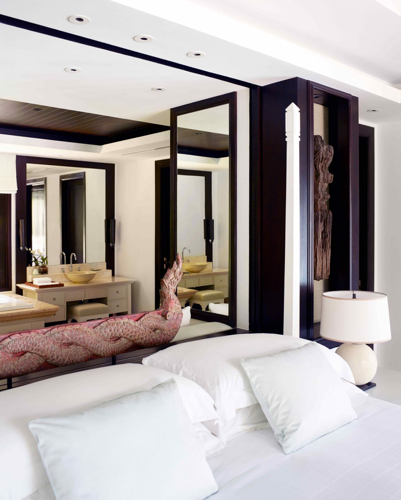 Warm wood plays off the Thai cultural accents