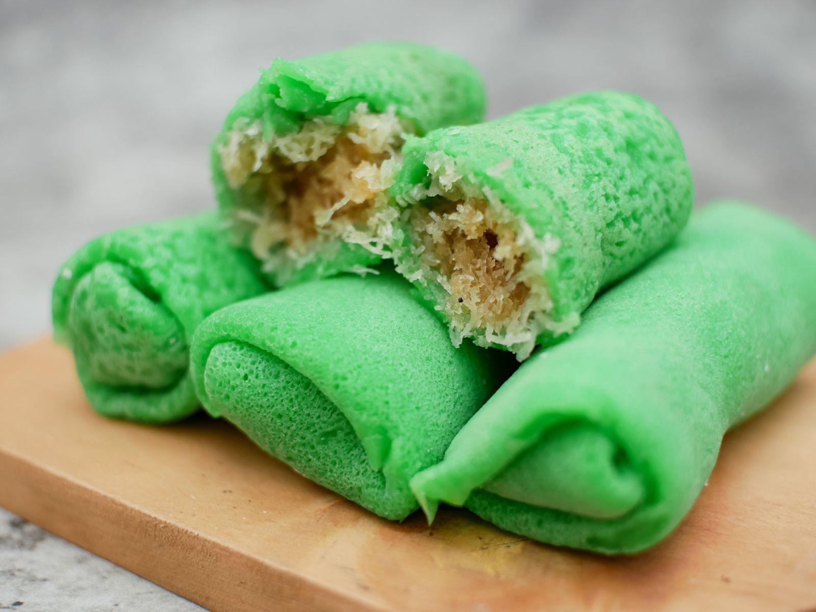 Kuih ketayap, a type of kuih made with grated coconut and palm sugar (Photo: Getty Images)