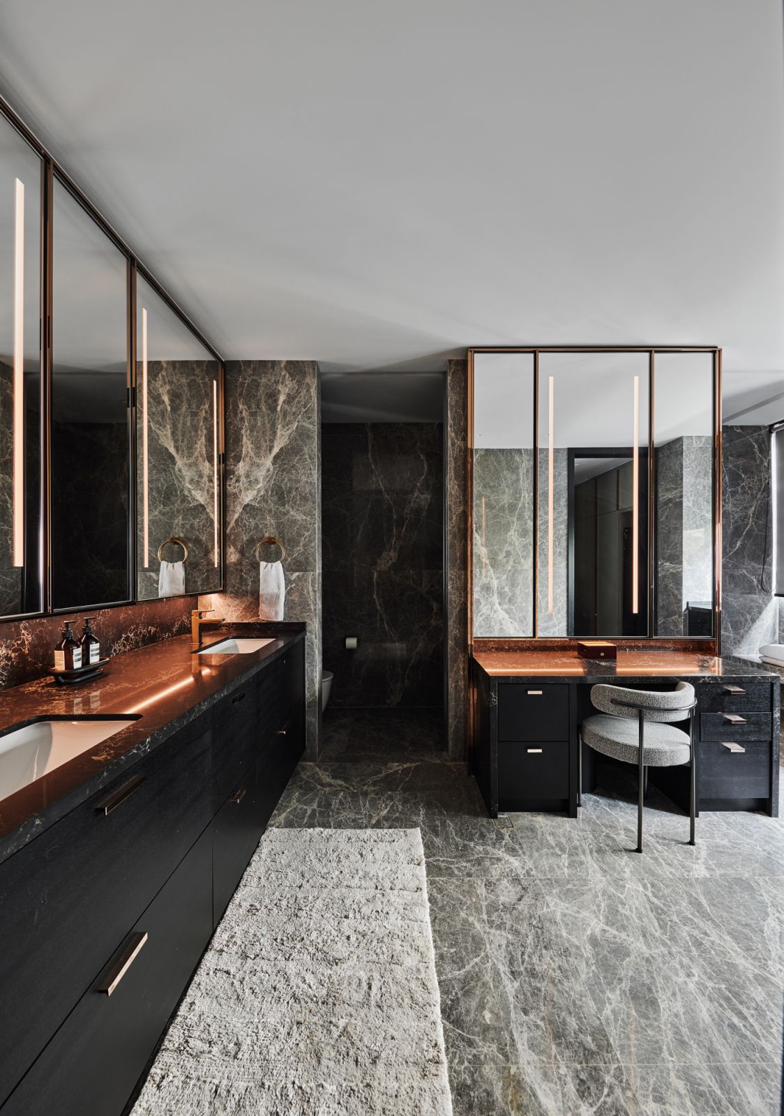 The luxurious master bathroom is the homeowners’ very own personal spa