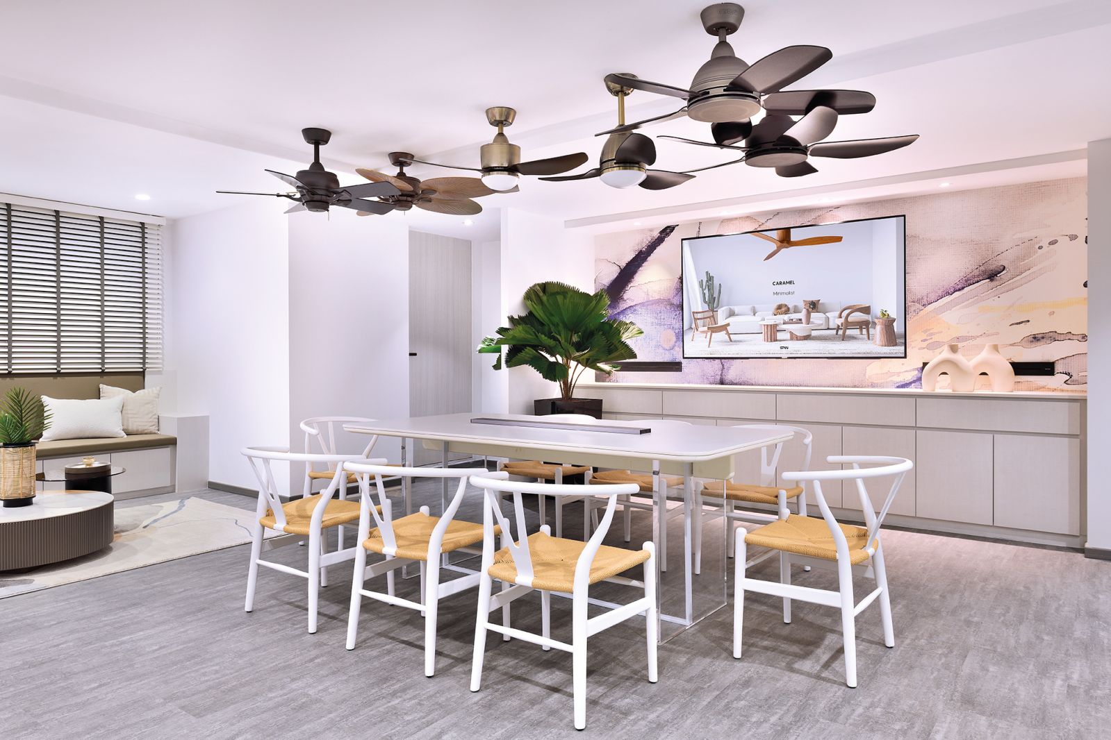 Various vintage fans inject a sense of personality to the sleek meeting room