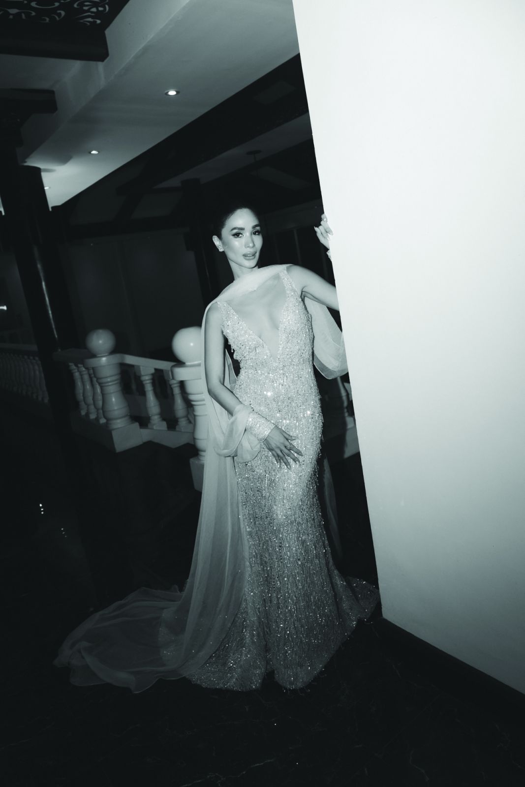 The bride wears a Michael Leyva gown