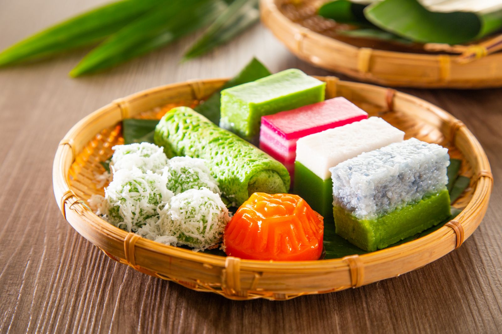 Ang ku kuih, onde-onde, kuih ketayap, kuih lapis, and more (Photo: Getty Images)