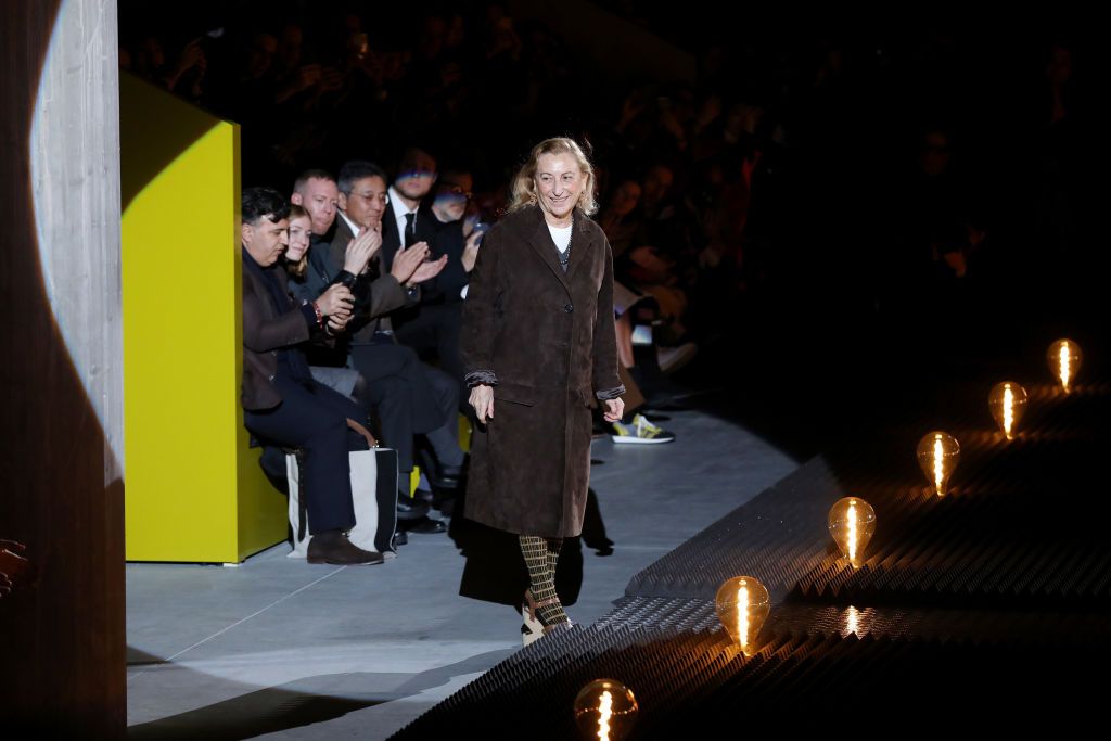 MILAN, ITALY - JANUARY 13:  Miuccia Prada walks the runway during the finale of the Prada show during Milan Menswear Fashion Week Autumn/Winter 2019/20 on January 13, 2019 in Milan, Italy.  (Photo by Tristan Fewings/Getty Images)