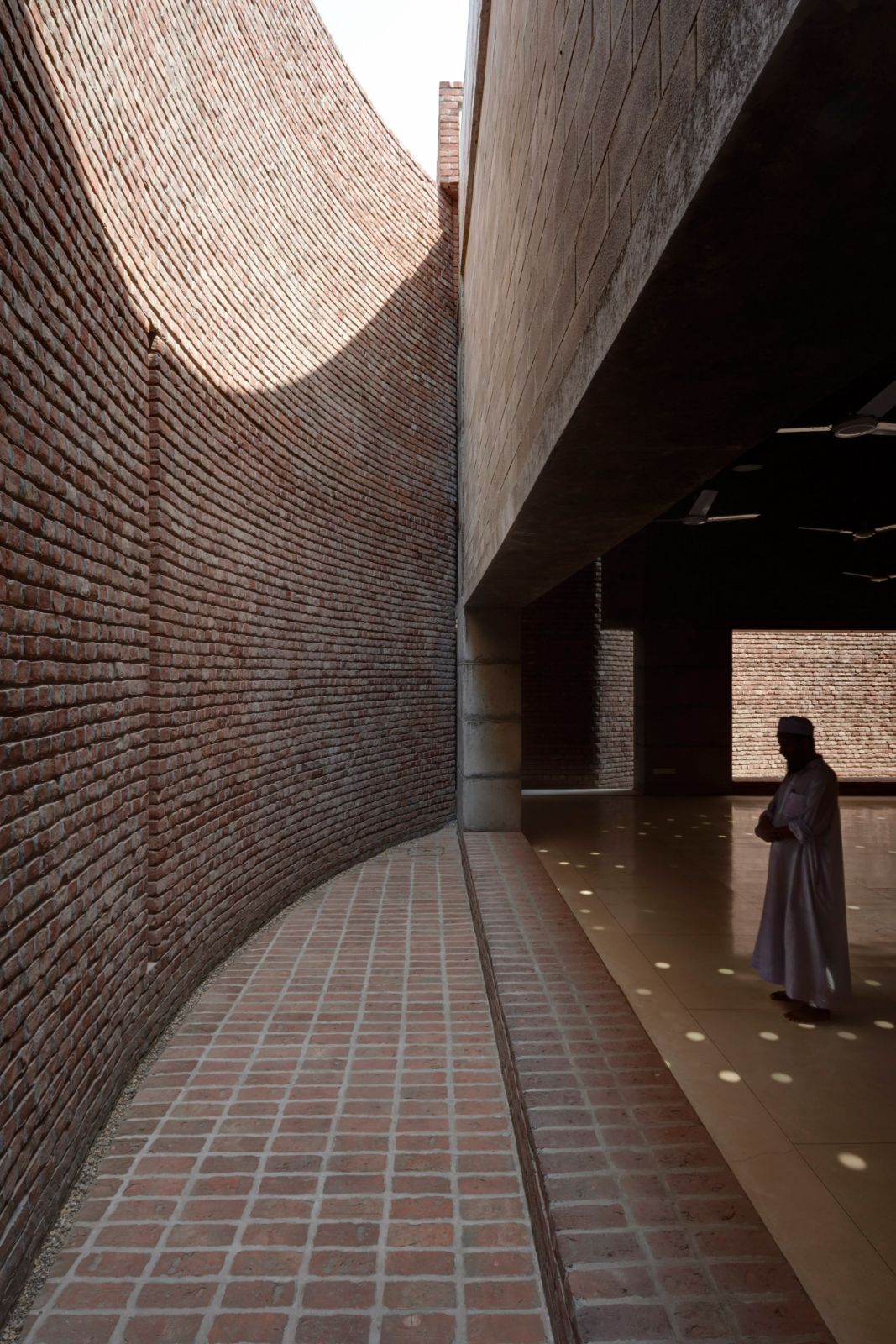 Three volumes of cylindrical reinforced concrete within the load-bearing brick structure (Photo: Courtesy of Marina Tabassum via @dezeen / Instagram)