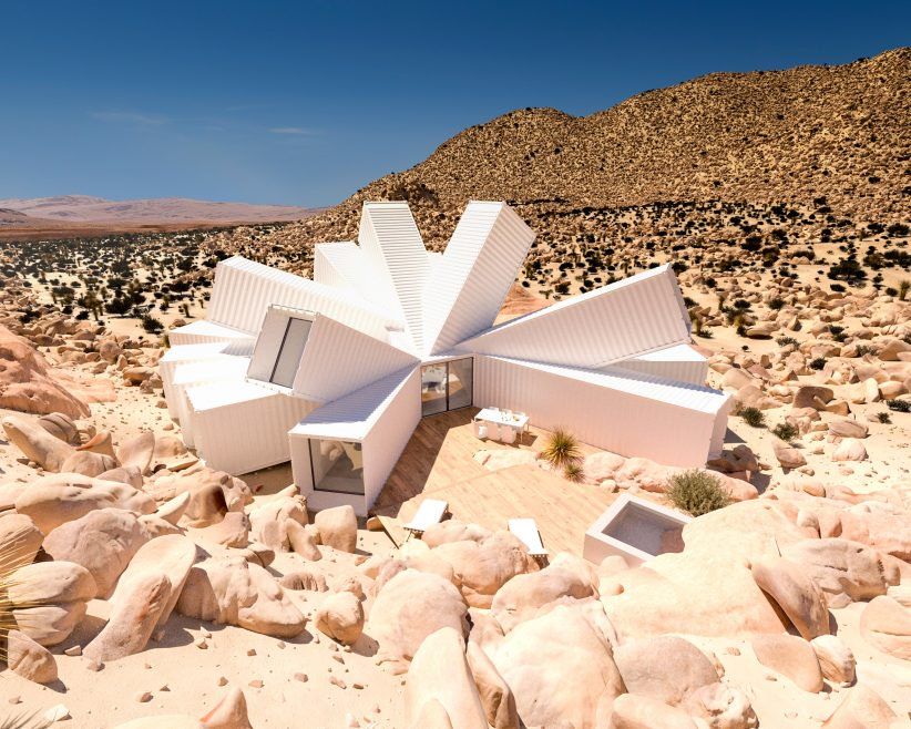 A cluster of shipping containers that forms a starburst-shaped exoskeleton