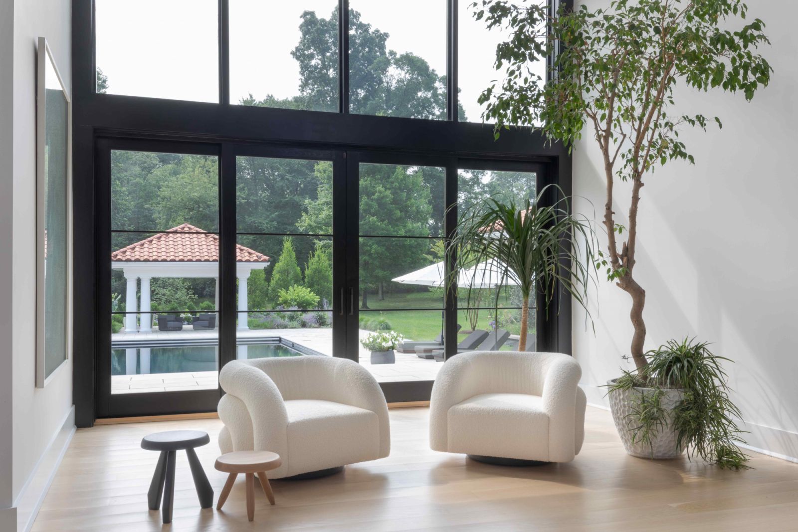 The strategically positioned doors in the foyer open to the garden