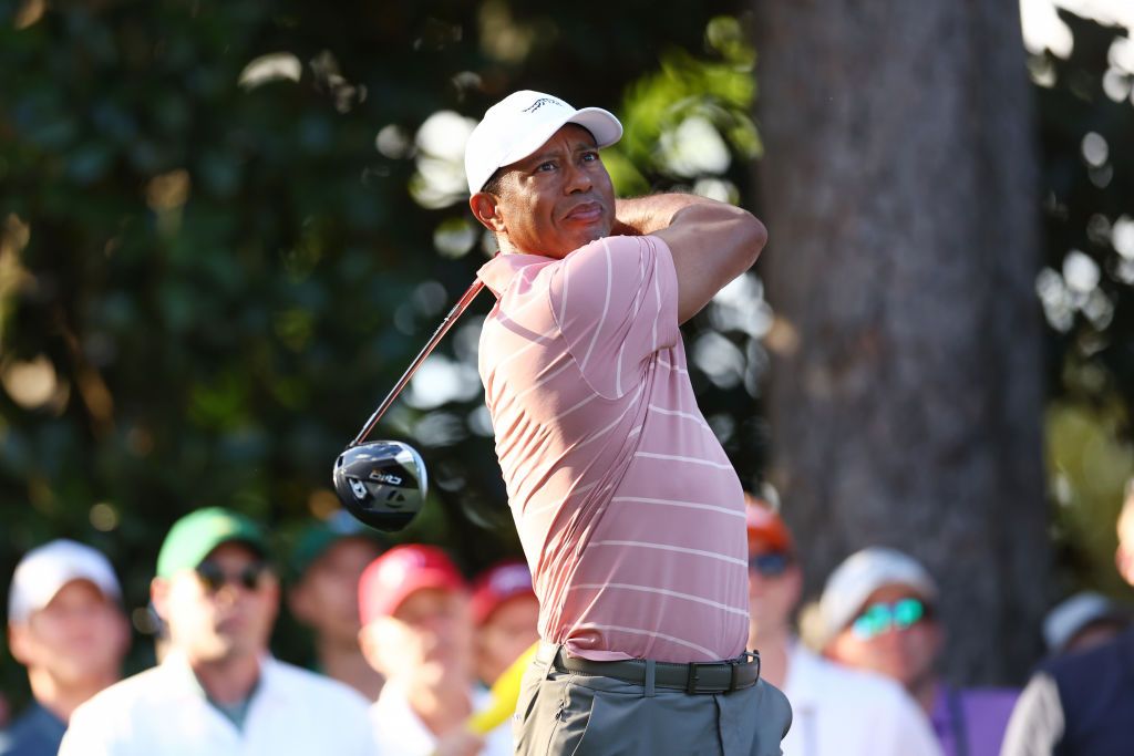 AUGUSTA, GEORGIA - APRIL 11: Tiger Woods of the United States plays his shot from the ninth tee during the first round of the 2024 Masters Tournament at Augusta National Golf Club on April 11, 2024 in Augusta, Georgia. (Photo by Maddie Meyer/Getty Images)