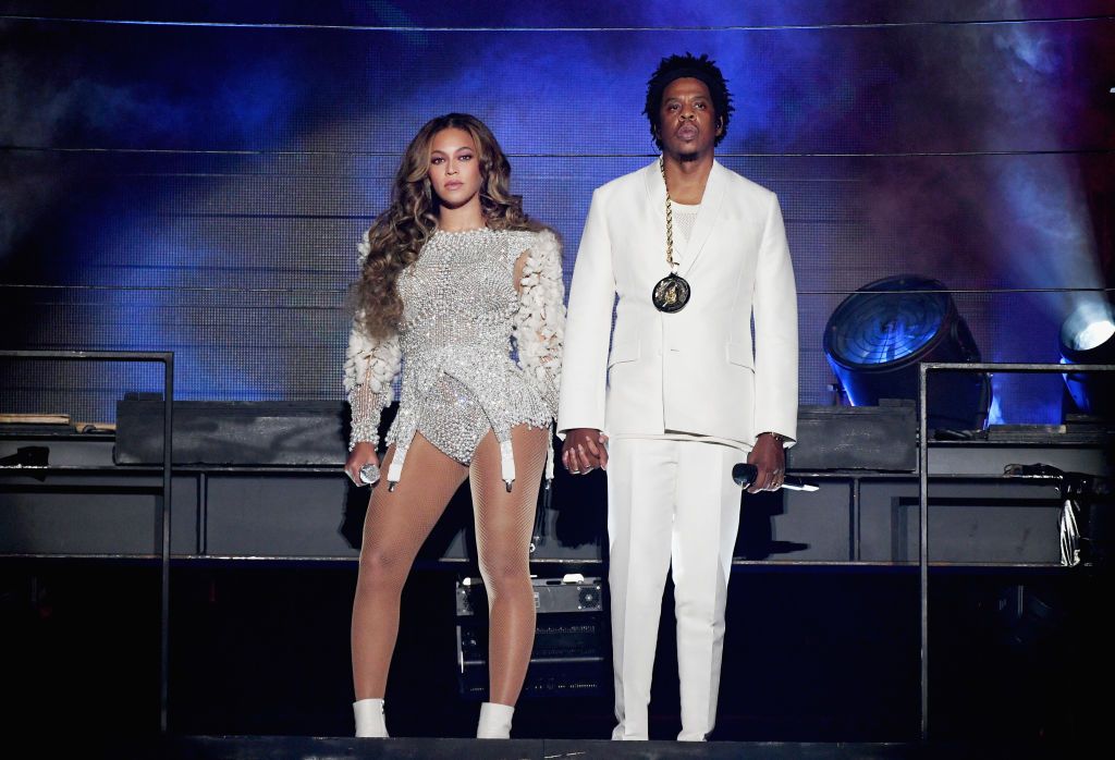 PASADENA, CA - SEPTEMBER 22: Beyonce (L) and JAY-Z perform onstage during the 'On The Run II' Tour at Rose Bowl on September 22, 2018 in Pasadena, California. (Photo by Larry Busacca/PW18/Getty Images for Parkwood Entertainment)