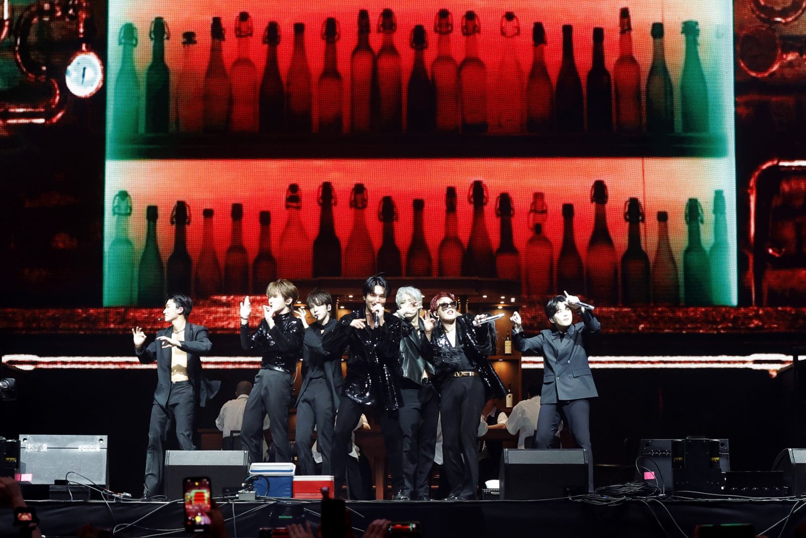 (L-R) San, Kang Yeo-sang, Jeong Yun-ho, Wooyoung, Song Min-gi, Kim Hong Joong, and Choi Jong-ho of ATEEZ performs at the Sahara Tent during the 2024 Coachella Valley Music and Arts Festival at Empire Polo Club on April 12, 2024 in Indio, California. (Photo by Frazer Harrison/Getty Images for Coachella)