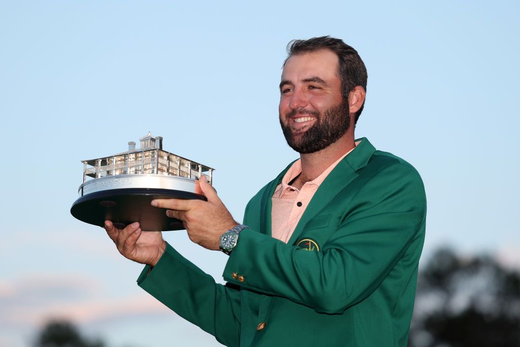 AUGUSTA, GEORGIA - APRIL 14: Scottie Scheffler of the United States poses with the Masters trophy after winning the 2024 Masters Tournament at Augusta National Golf Club on April 14, 2024 in Augusta, Georgia. (Photo by Warren Little/Getty Images)