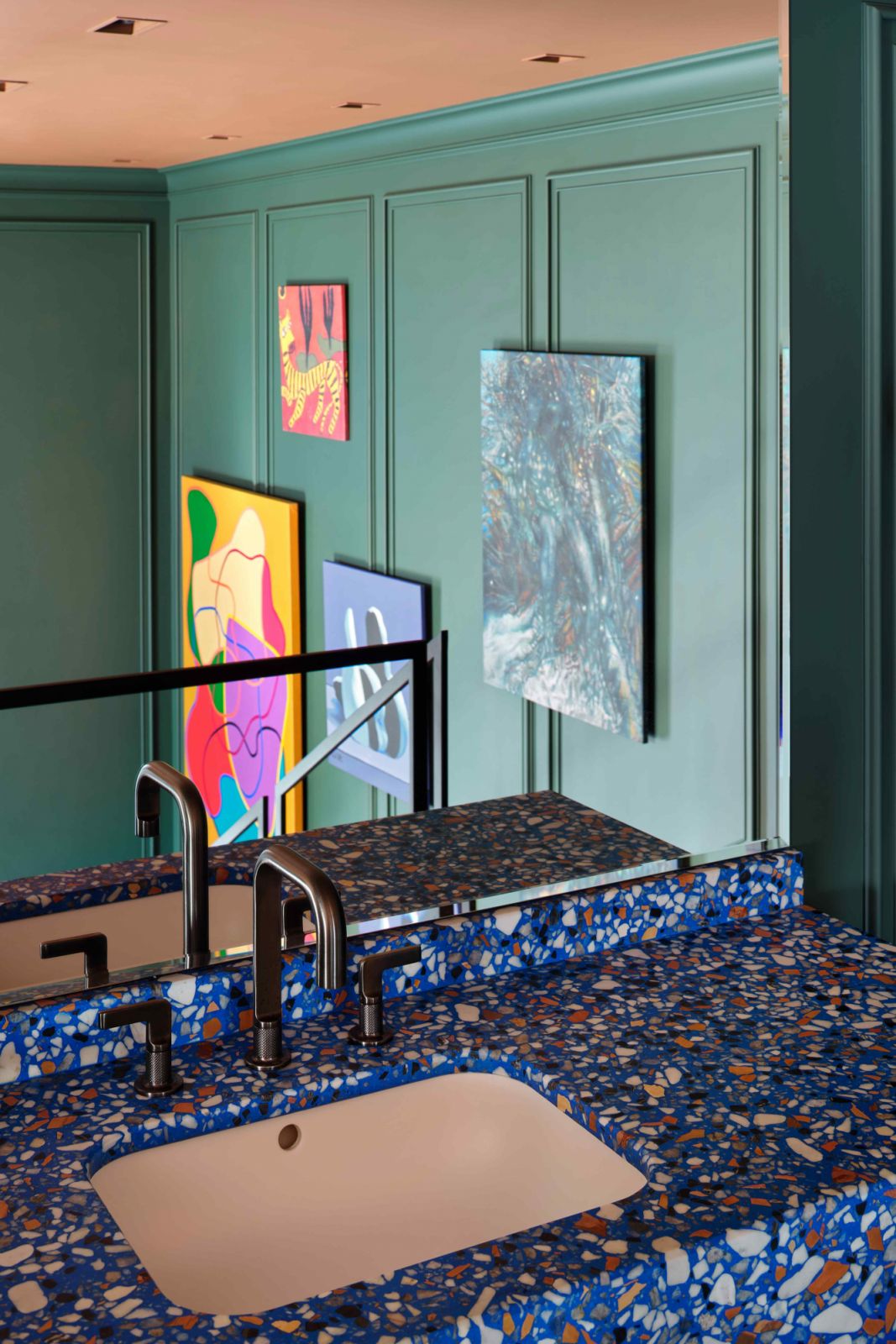 A matching blue terrazzo countertop on the mezzanine level