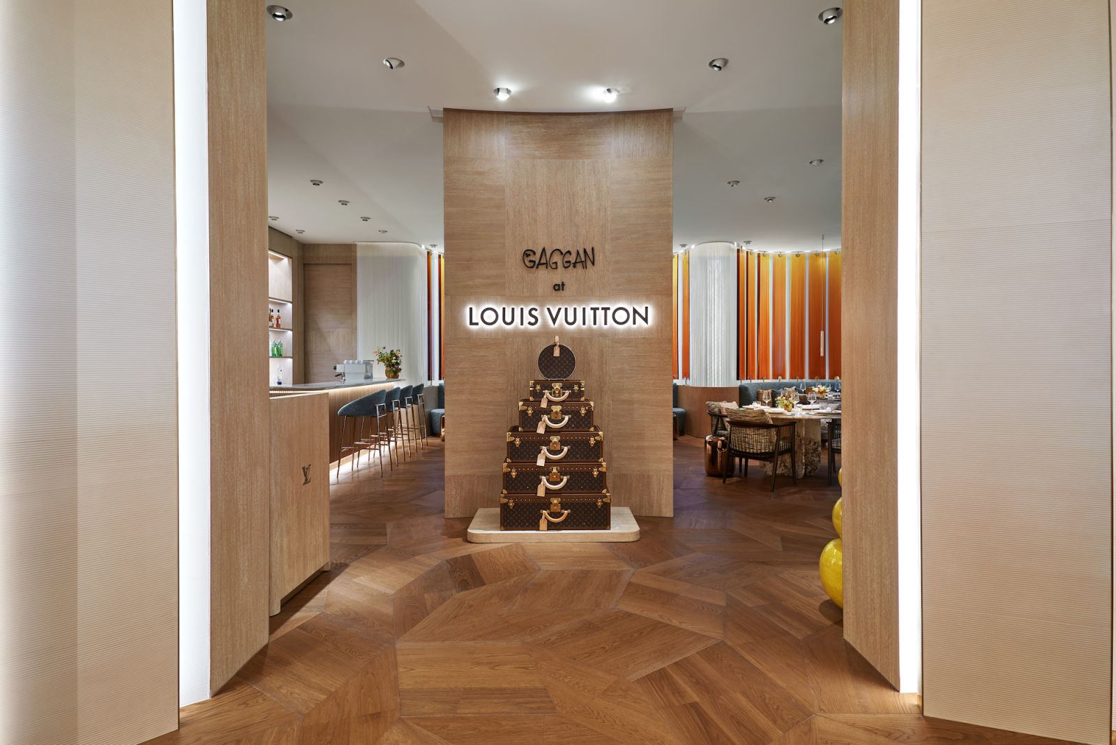 The entrance to the restaurant is signalled by a pyramid of Louis Vuitton’s trunks