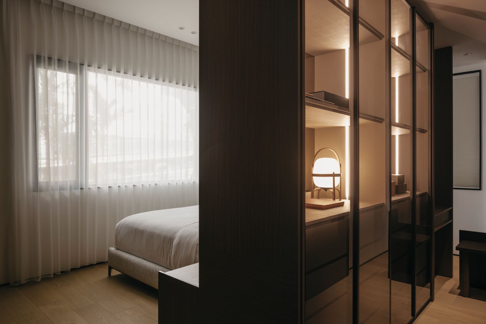 Another view of the master bedroom, with its utterly functional integrated dresser which also doubles as a unique headboard