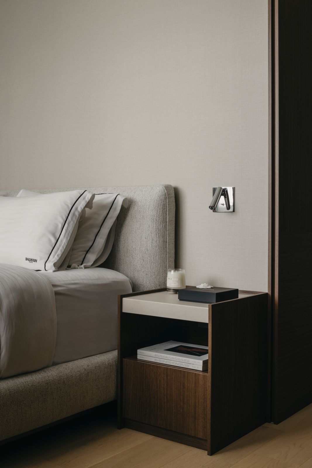 Neutral hues and soft textures infuse the master bedroom with a restful atmosphere