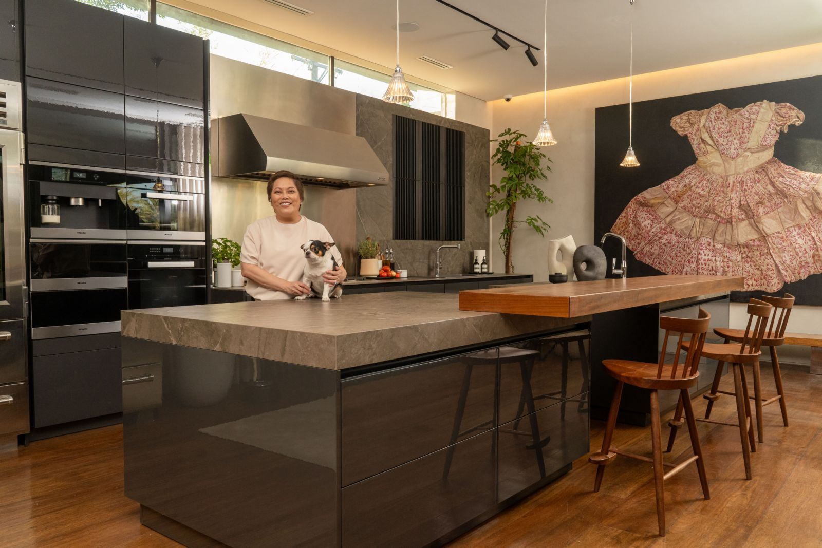 Dada Beltran and her furry companion in her SieMatic kitchen (Photo: Courtesy of Focus Global Inc)