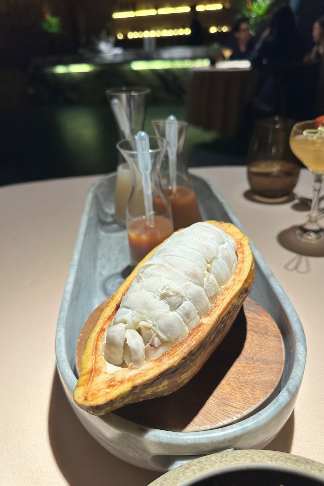 The cacao fruit, juice, syrup and vinegar from The Unknown Faces of Cacao menu by Gallery by Chele
