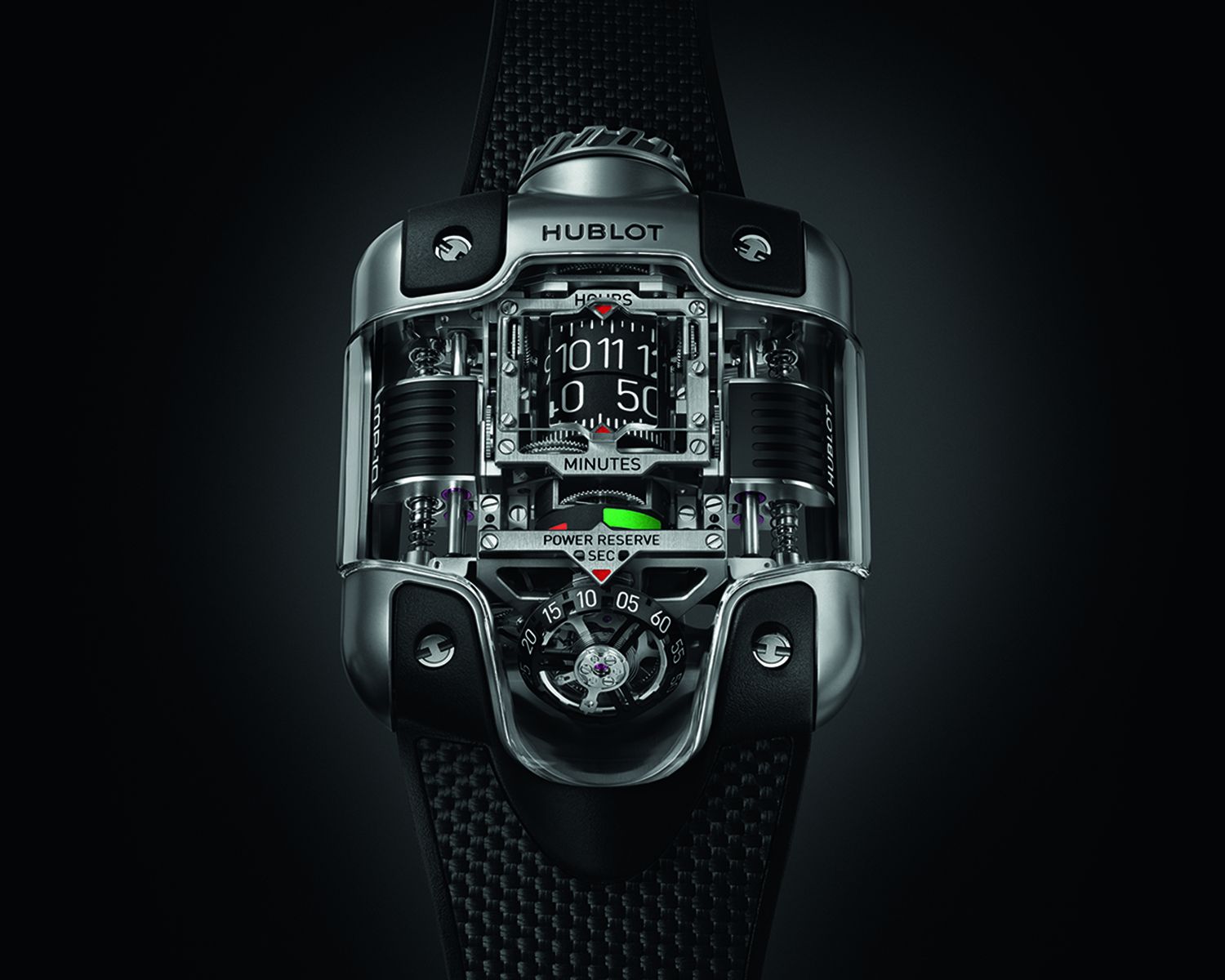 MP-10 Tourbillon Weight Energy System  ตัวเรือนไทเทเนียมไมโครบลาสต์ขัดเงาขนาด  54.1 x 41.5 มม. หนา 22.4 มม. กันน้ำได้ลึก 30 เมตร หน้าปัดสีดำ เผยให้เห็นกลไกด้านใน