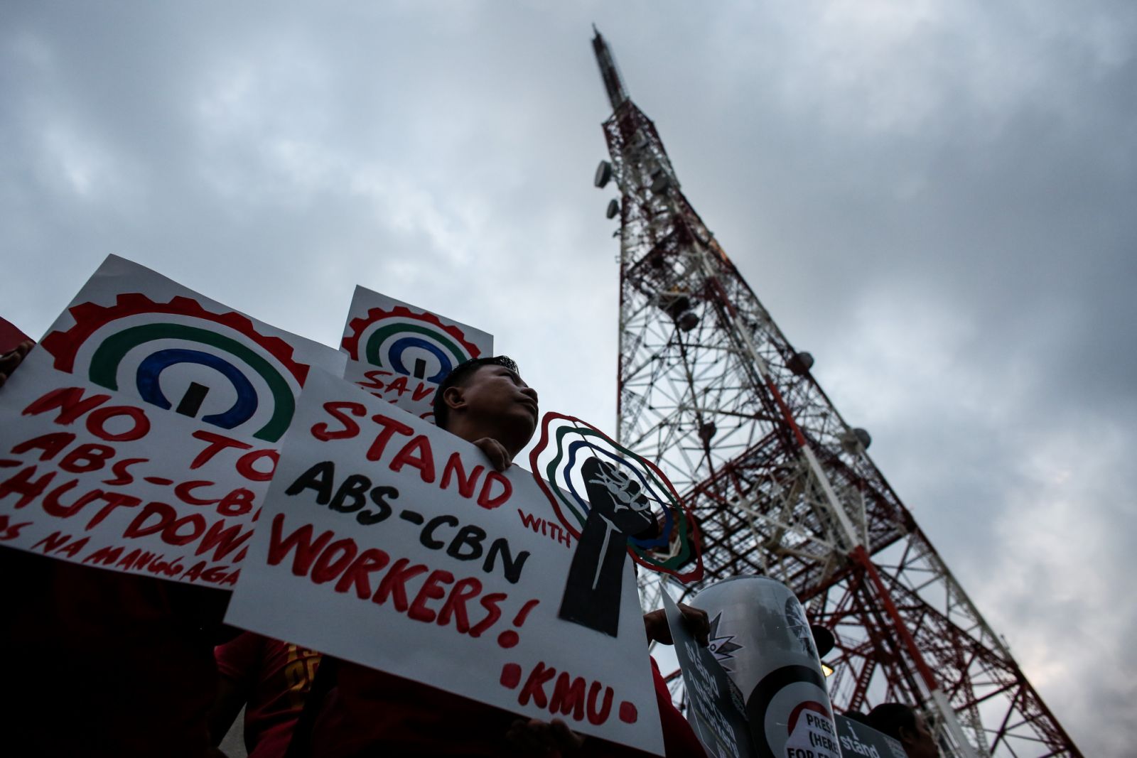 Protesters hold placards during a rally on press freedom following attempts to shutdown ABS-CBN, the largest broadcasting network in the country in Quezon City, Metro Manila (Photo: Basilio H. Sepe/Majority World/Universal Images Group via Getty Images)