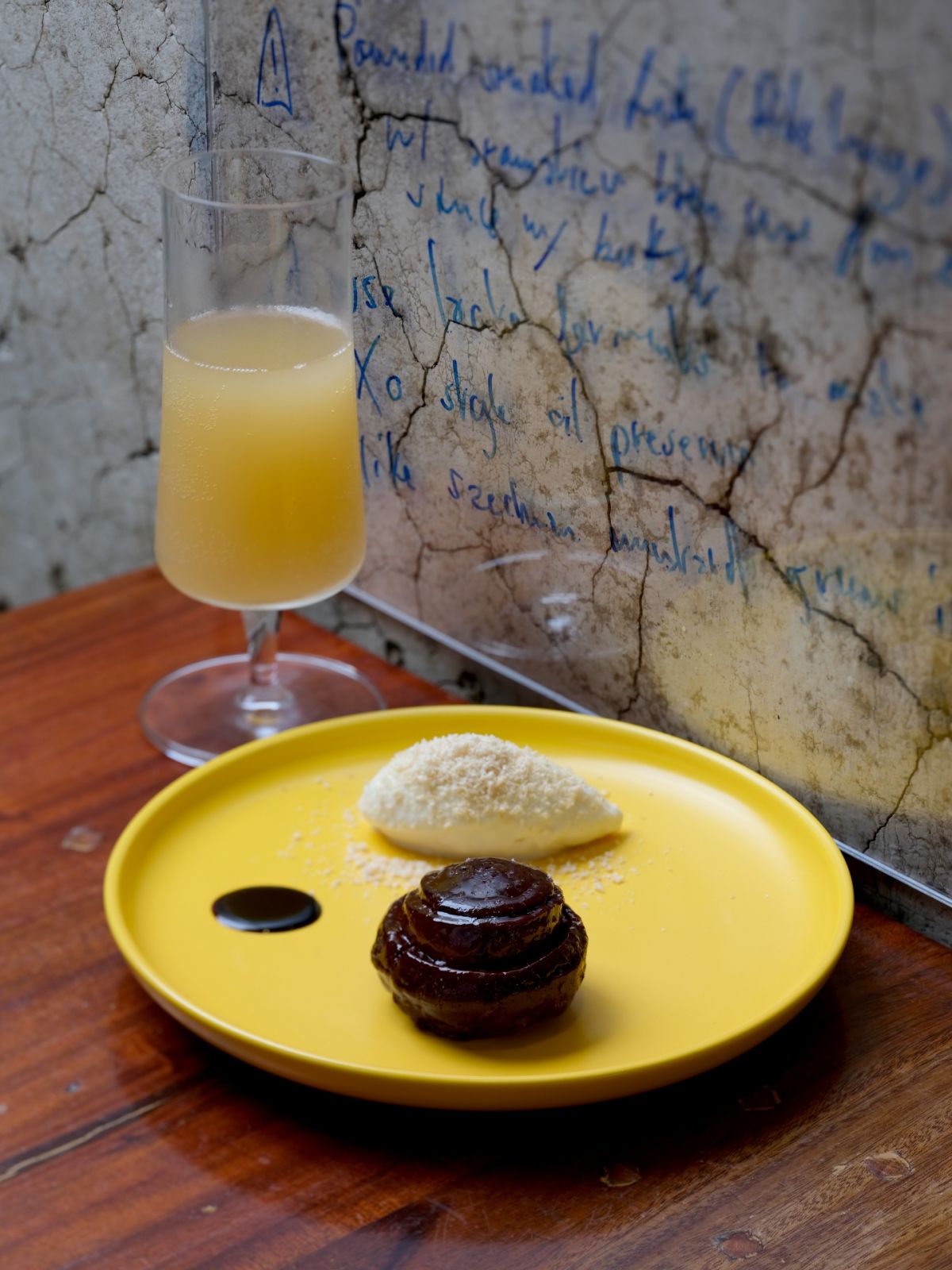 Bread Course - Metiz - caramelized ensaimada, aged goats cheese and soured milk, a reduction of aged tapuy - Stephan Duhesme