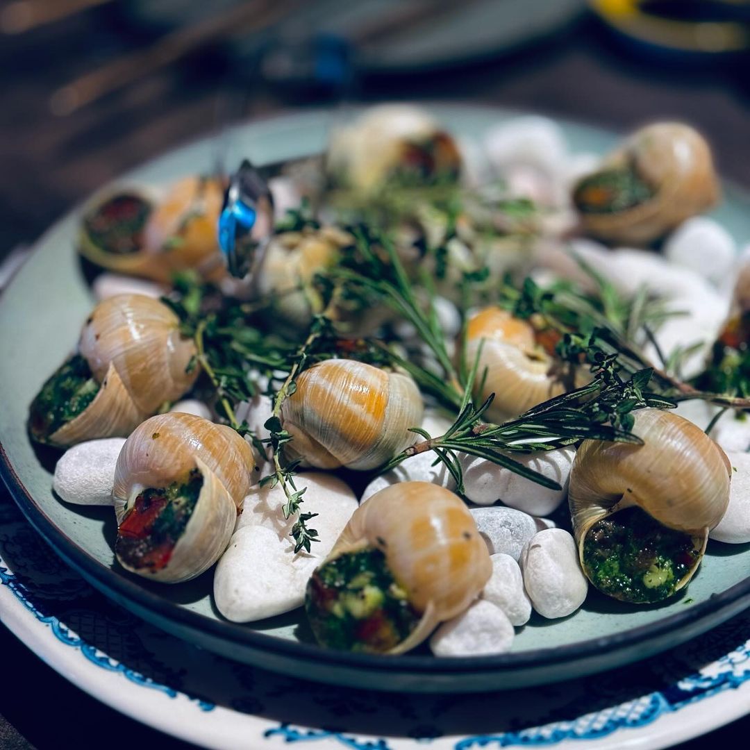 Escargot with herb butter (Photo: Instagram / @diva.eats)