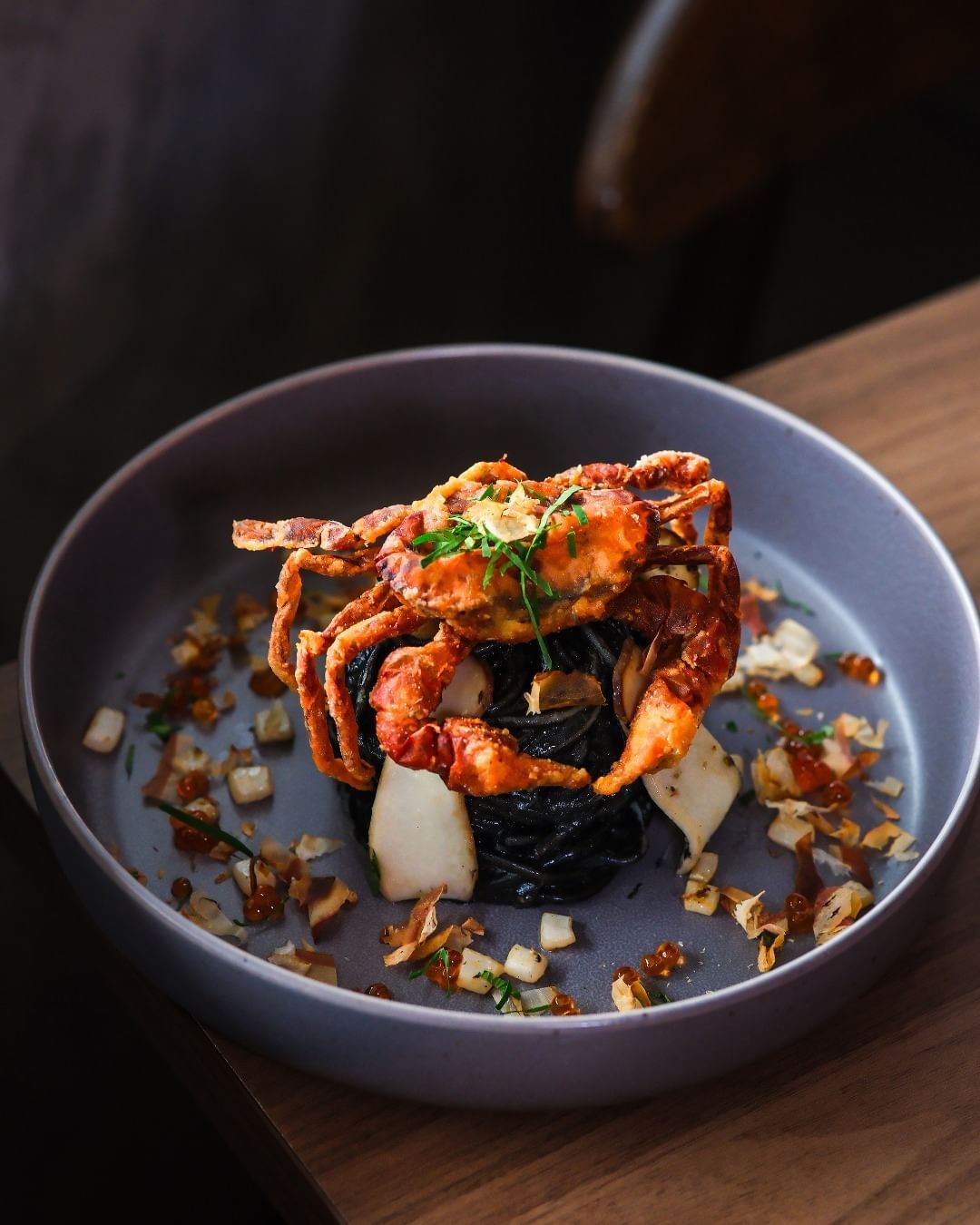 Squid ink and soft shell crab pasta from The Charcoal Grill Damansara Uptown, a new restaurant to check out in May (Photo: Instagram / @thecharcoalgrill_)