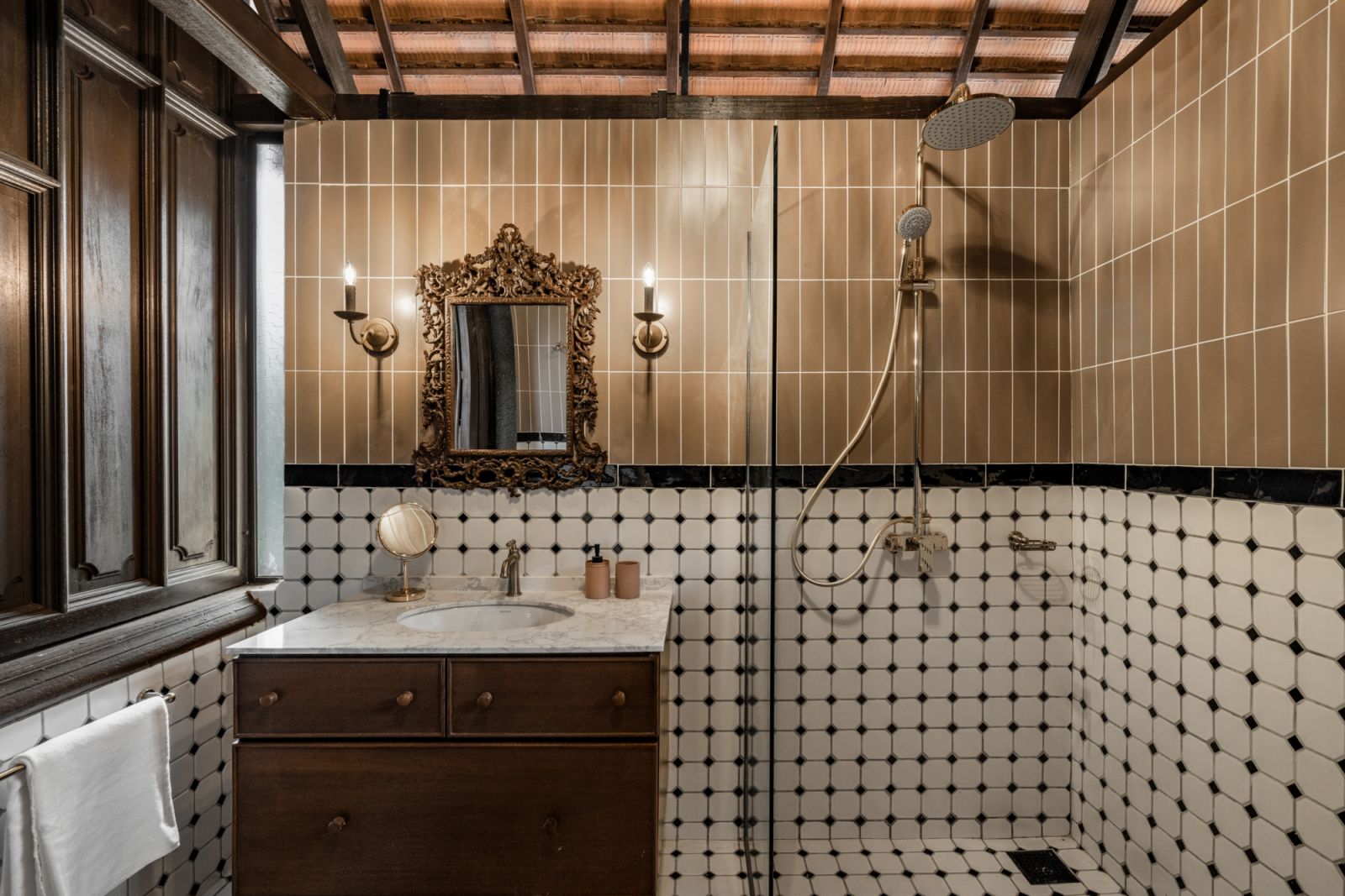 Ashtana Tela has modern bathrooms within its traditional envelope