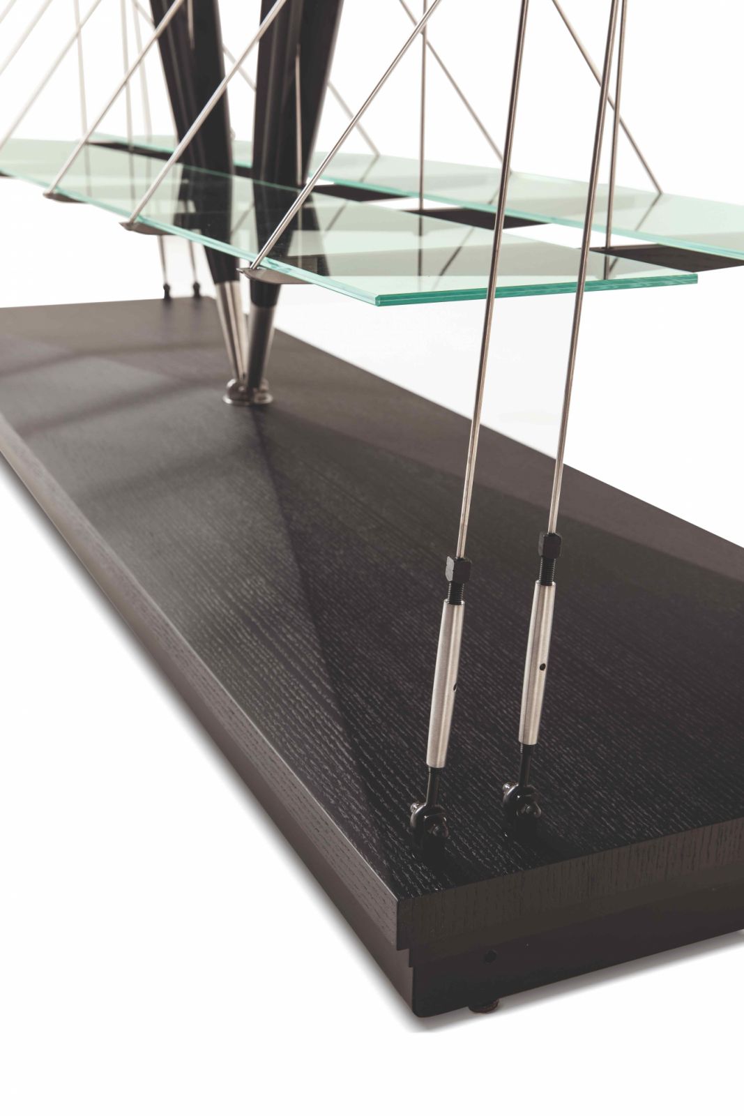 An 80kg metal plinth concealed beneath the ash wood base (Photo: Cassina)